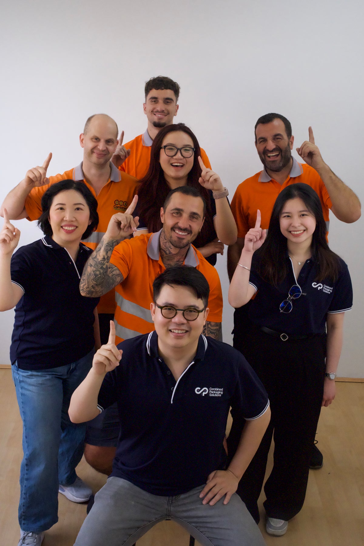 The CPS team pointing up